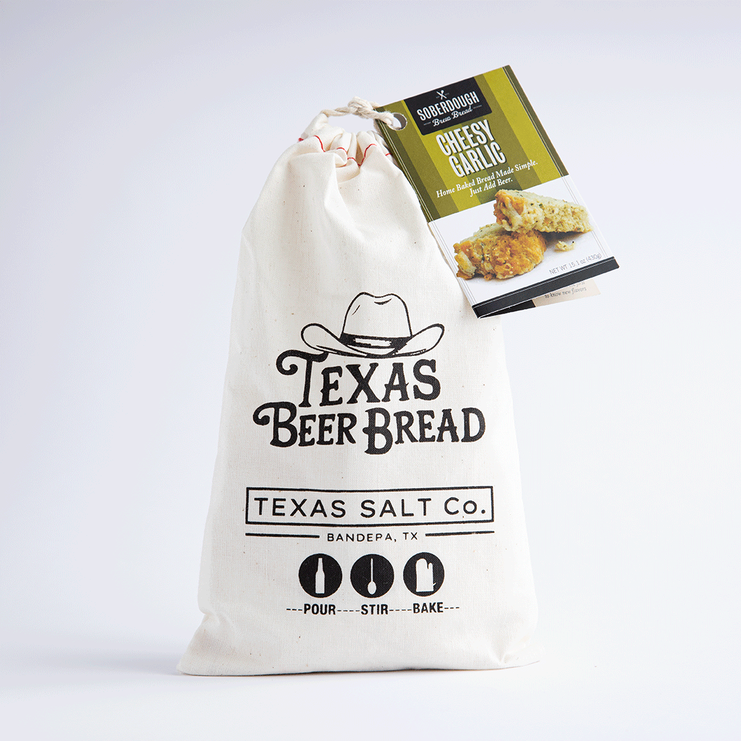 Texas Salt Co Texas Beer Bread bag with a Soberdough Cheesy Garlic flavor tag