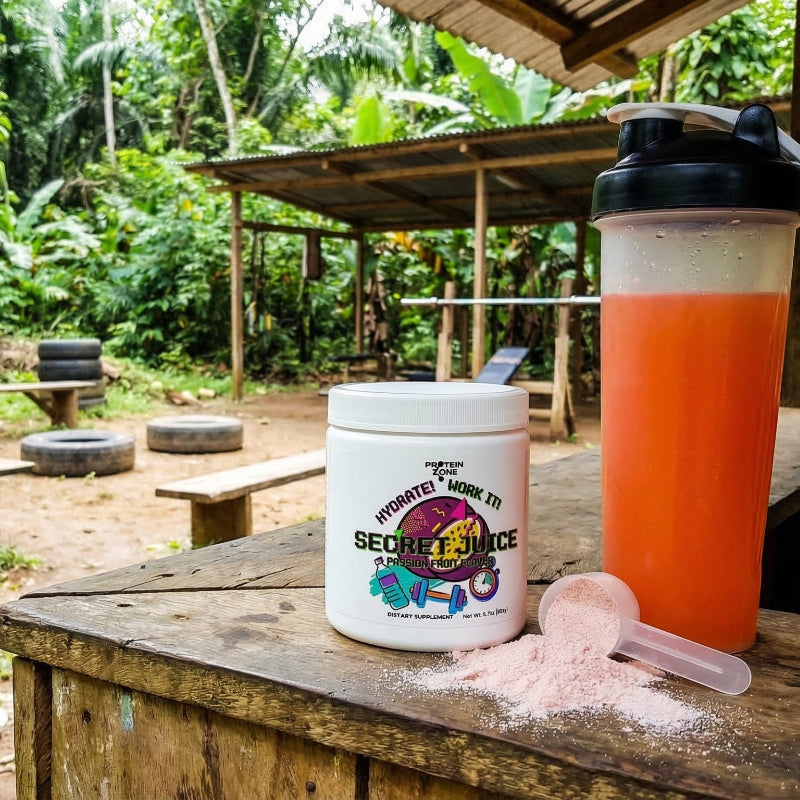 Secret Juice Passion Fruit Hydrating Powder powder container on counter of outdoor gym in