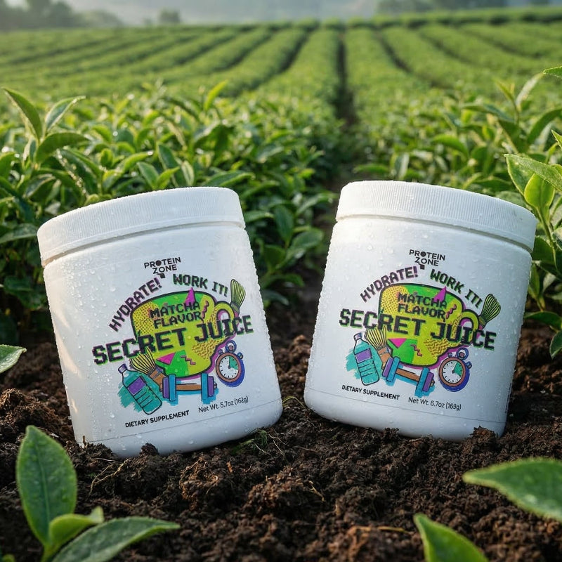 Secret Juice Matcha Hydrating Powder powder container on ground in lush field of green