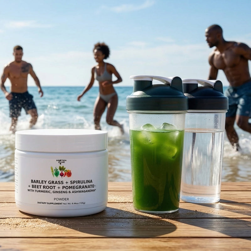 Green Superfood Energy Complex powder container on table on beach with shaker bottle 1